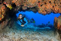 Diver In Cave. Cayman Islands