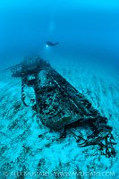 Diver Over Submarine Wreck, UK