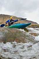 Canoeist In Highland River. UK.