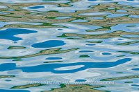 Reflections On Calm Sea. Cornwall, UK.