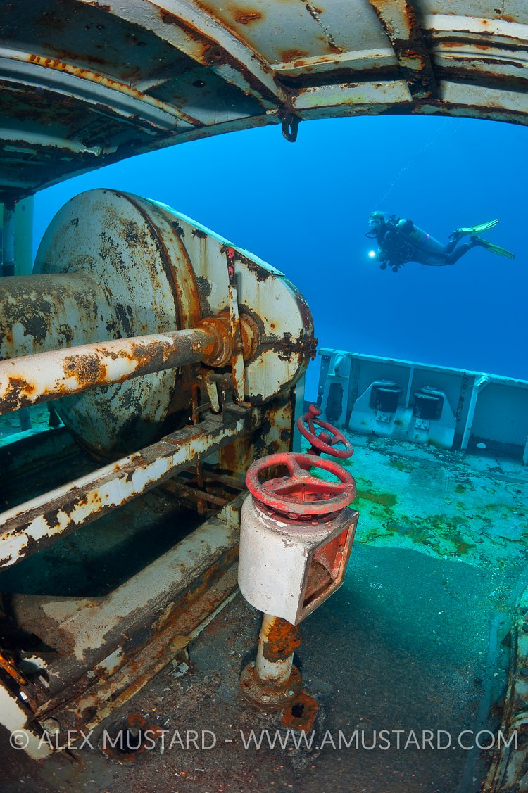 Winches and diver. USS Kittiwake, Cayman Islands.