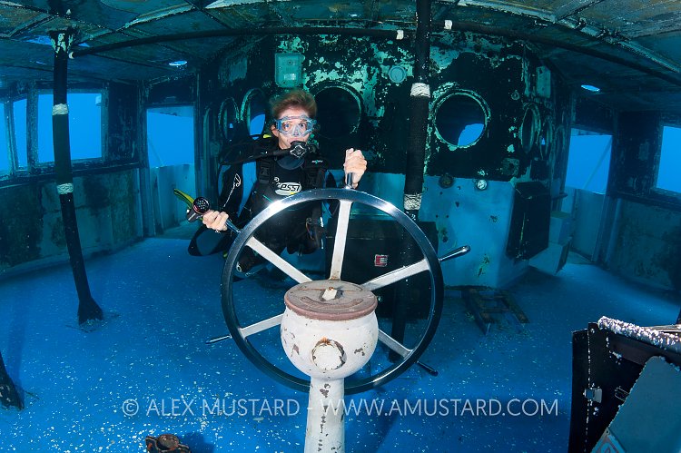 Diver on the bridge of the USS Kittiwake. Cayman Islands.
