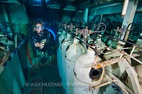 DIver and cylinders on USS Kittiwake. Cayman Islands.