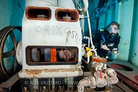 DIver and compressor on USS Kittiwake. Cayman Islands.