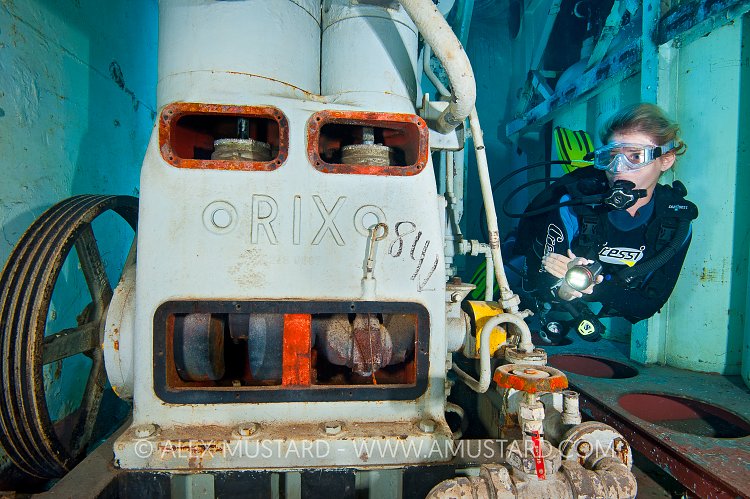 DIver and compressor on USS Kittiwake. Cayman Islands.