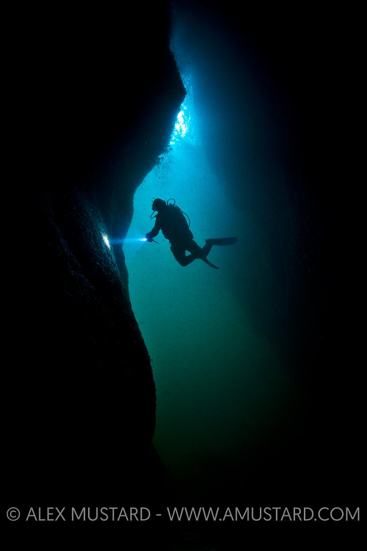 Scuba Diver In Cave. Shetland, UK.