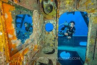 Diver In Bathroom. Cayman Islands