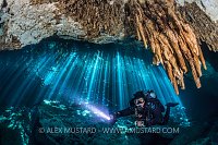 Diver With Stalagmites. Mexico