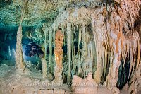 Diver With Cave Formations. Mexico