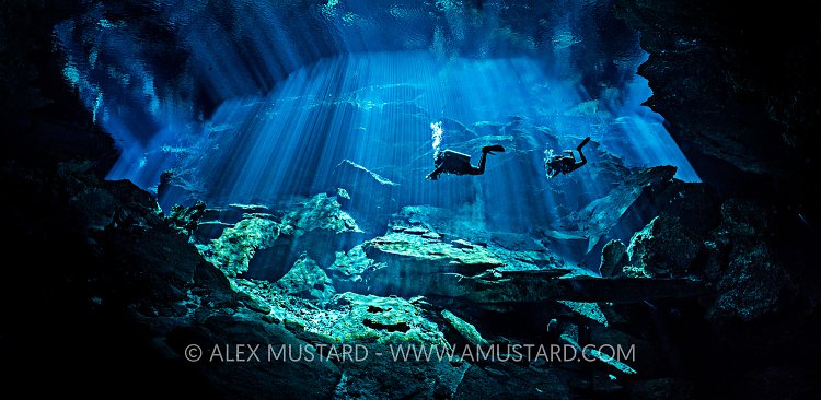 Divers In Sun Beams. Mexico