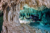 Diver Explores Cenote. Mexico
