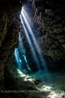 Sun Beams In Coral Cave. Egypt