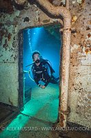 Diver Through Doorway. Cayman Islands