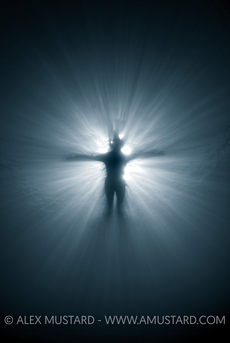 Silhoutted Snorkeller. UK