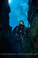 Diver in Canyon. Iceland.
