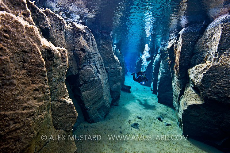 Diver in Nes Canyon. Iceland