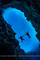 Divers In Slifra, Silhouette. Iceland
