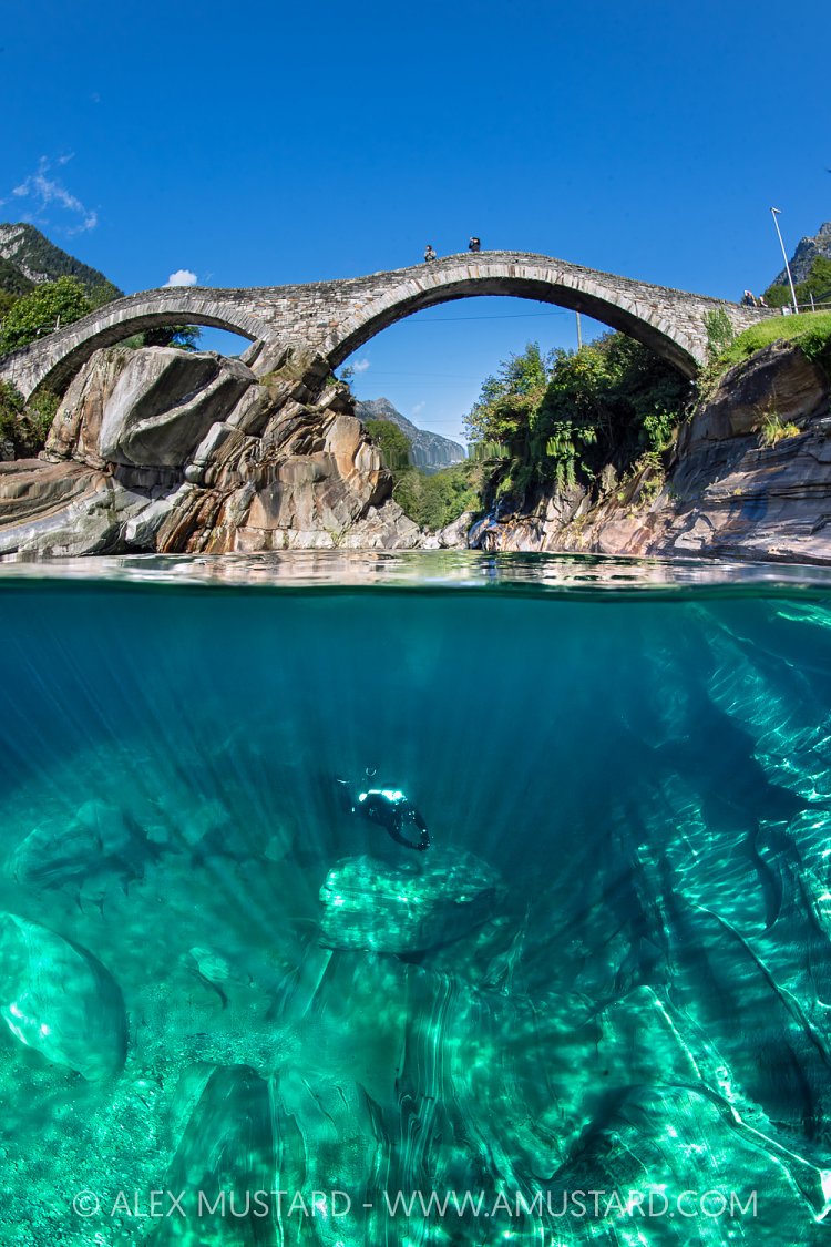 Diver In River Verzasca, Switzerland