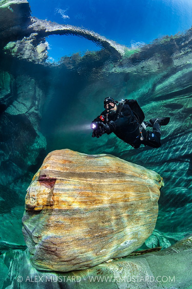 Diver In River Verzasca, Switzerland
