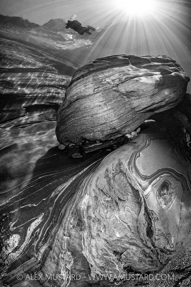 Diver In River Verzasca, Switzerland