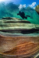 Diver In River Verzasca, Switzerland