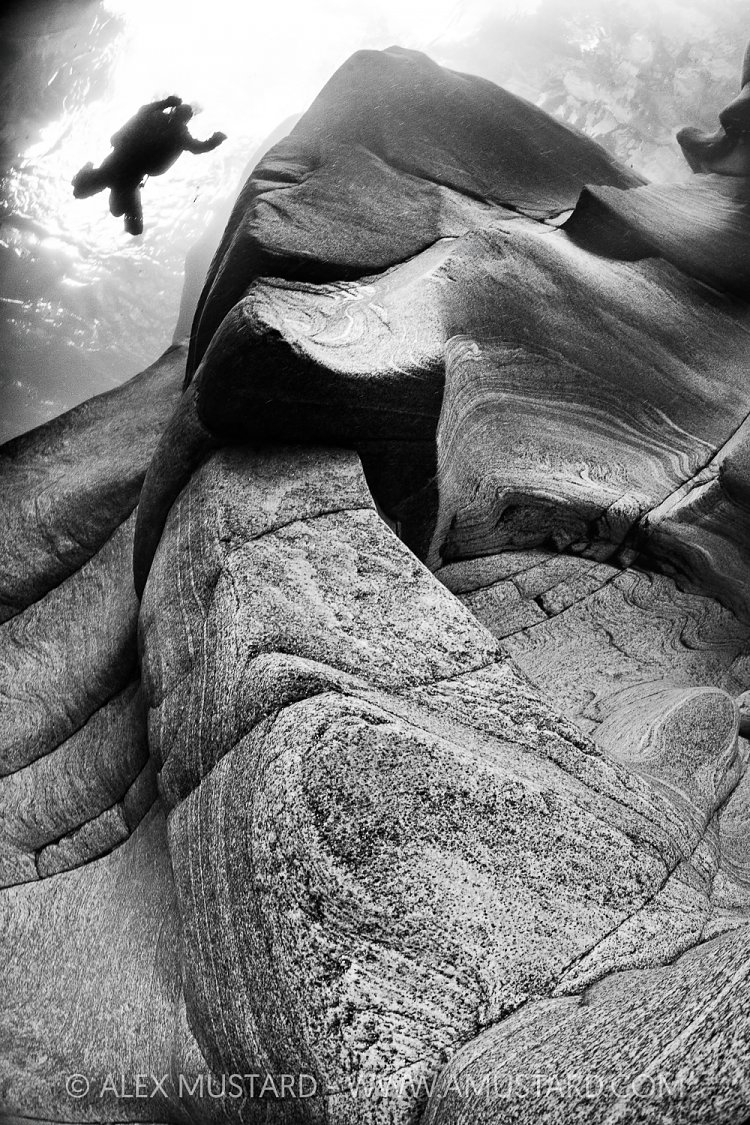 Diver In River Verzasca, Switzerland