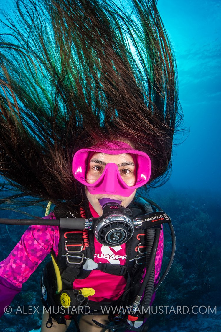 Diver's Hair Underwater. Cayman Islands