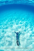 Freediver In Turquoise Sea, Italy
