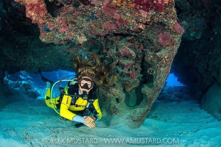 Exploring Caverns On Coral Reef, Cayman Islands