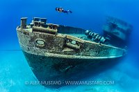 Snorkeller on scooter over Kittiwake. Cayman Islands