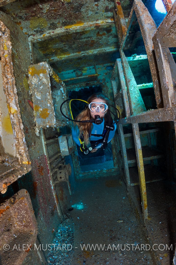 Diver Inside Kittiwake. Cayman Islands.