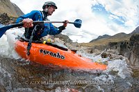 Canoeist In Highland River. UK.