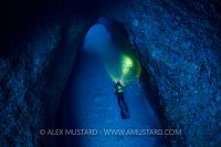 Diver In Underwater Cavern. Sardinia