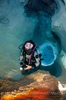Diver In Ghost Cave. Sardinia, Italy.