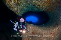 Diver In Cave. Sardinia, Italy