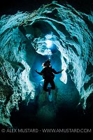 Diver Relaxes Underground. Sardinia, Italy.