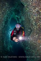 Diver In Nereo's Cave. Sardinia, Italy.