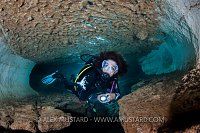 Diver In Ghost Cave. Sardinia, Italy