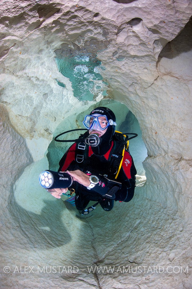 Diver in Ghost Cave, Sardinia, Italy